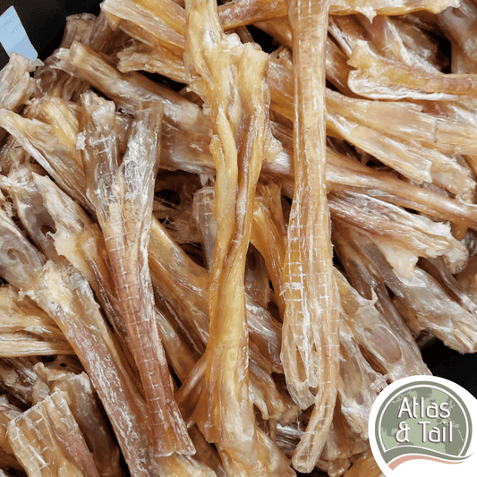 Close-up of Atlas & Tail Beef Branch tendon chews showing natural variation
