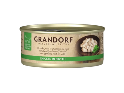 A can of Grandorf Natural & Healthy Chicken in Broth wet cat food, featuring a beige and green label with a photo of chicken pieces on a dark plate.