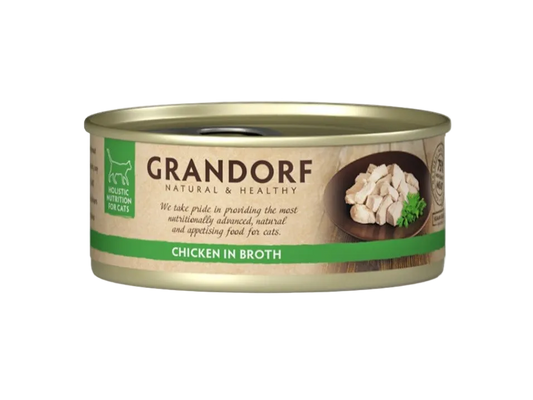 A can of Grandorf Natural & Healthy Chicken in Broth wet cat food, featuring a beige and green label with a photo of chicken pieces on a dark plate.