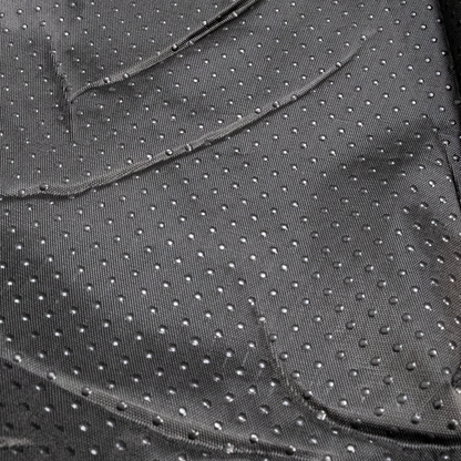 Close view of the anti-slip underside on the light-grey donut bed