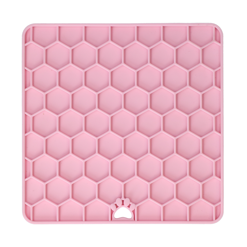 Pink Eat Slow Live Longer honeycomb dog lick mat on a transparent background