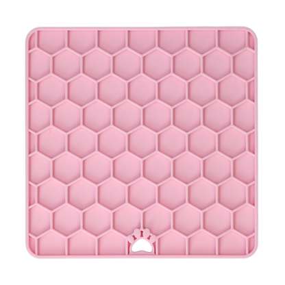 Pink Eat Slow Live Longer honeycomb dog lick mat on a transparent background