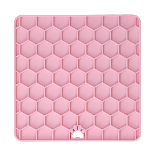 Pink Eat Slow Live Longer honeycomb dog lick mat on a transparent background